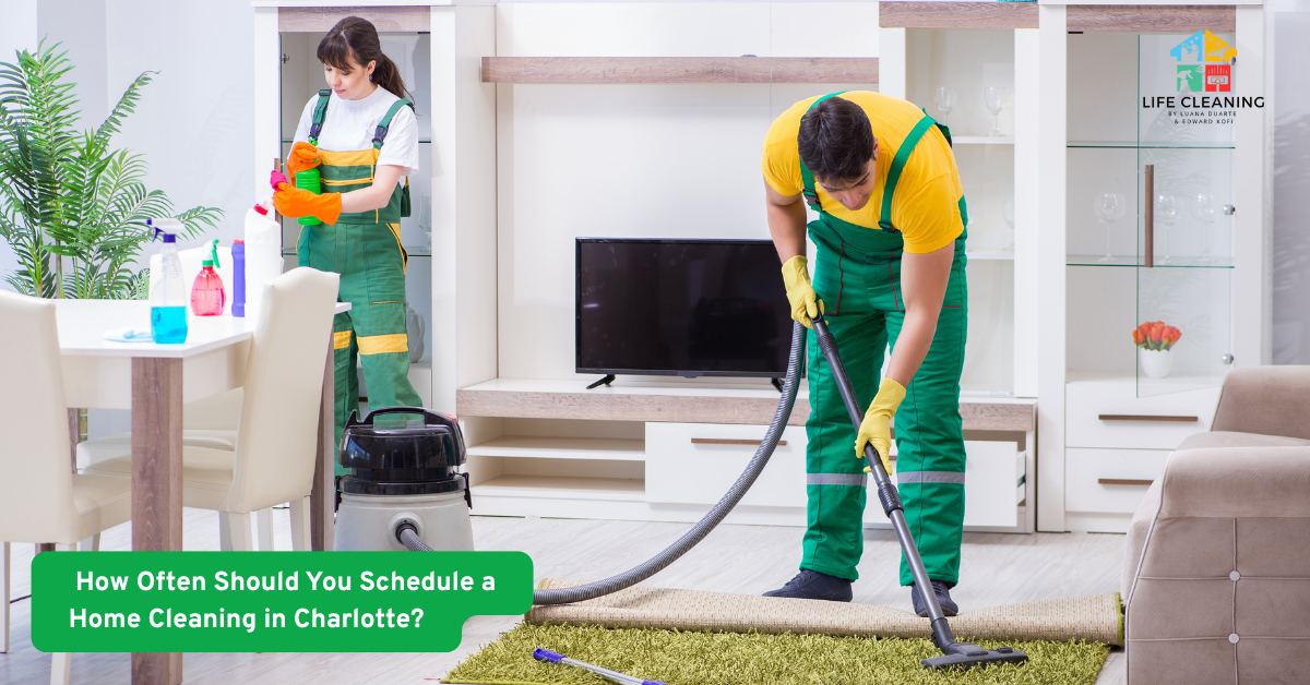 Professional home cleaners vacuuming and sanitizing a modern living room in Charlotte, North Carolina — part of Life Cleaning Services LLC.