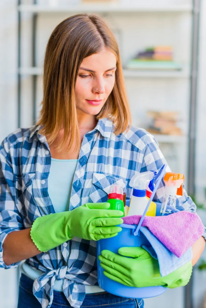 Young woman cleaning the house_converted